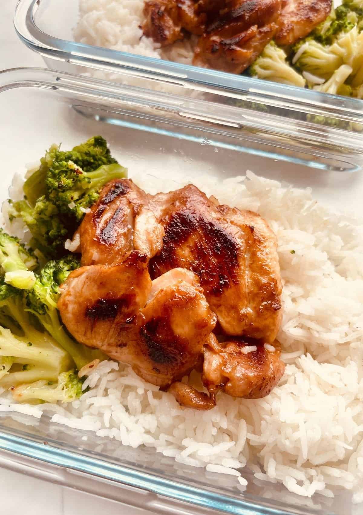 Honey Garlic Chicken with rice and broccoli meal prep container.