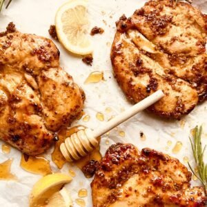 Juicy honey mustard chicken breasts marinated and cooked to perfection. Ideal for grilling or baking.