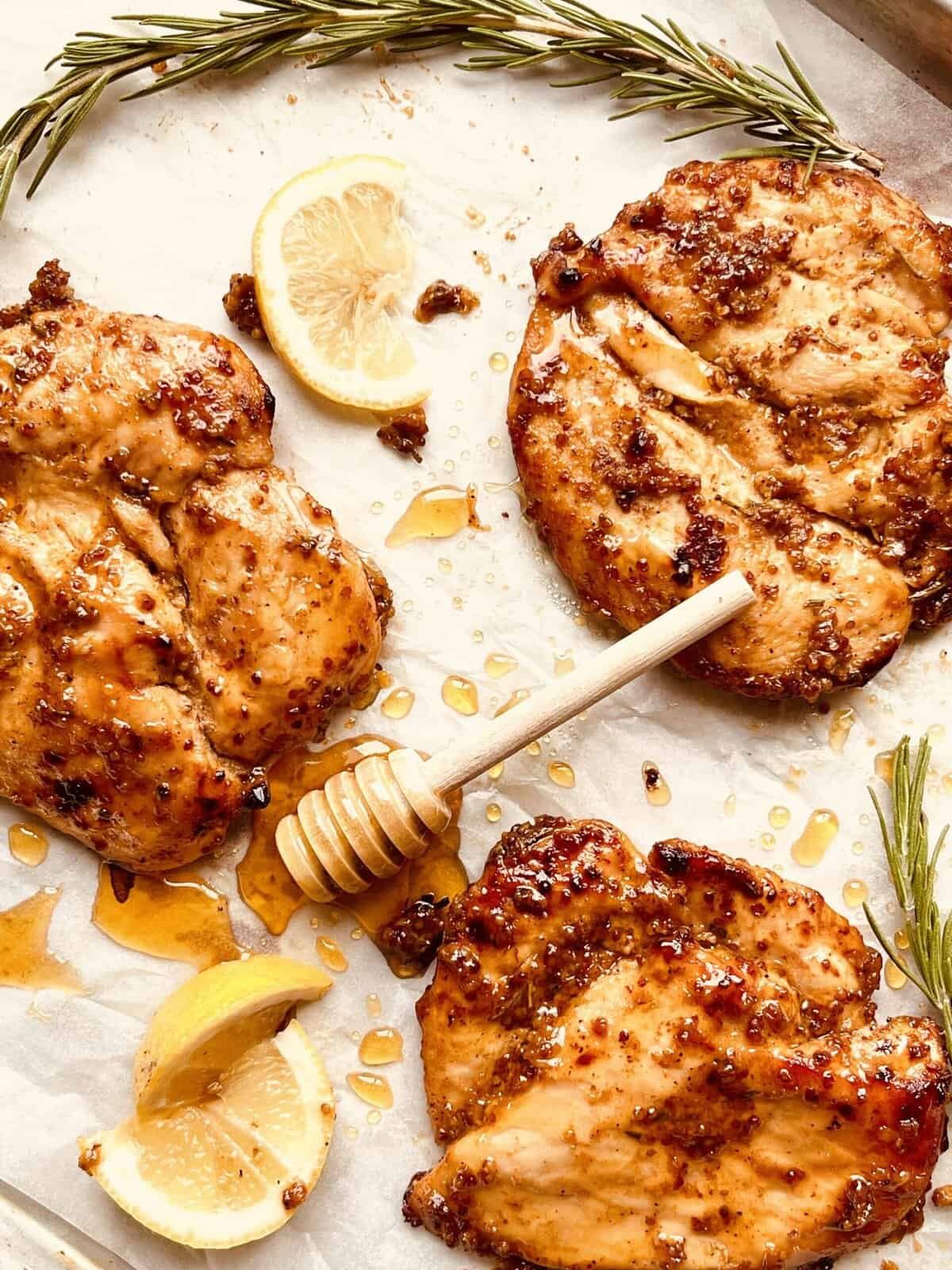 Juicy honey mustard chicken breasts marinated and cooked to perfection. Ideal for grilling or baking.