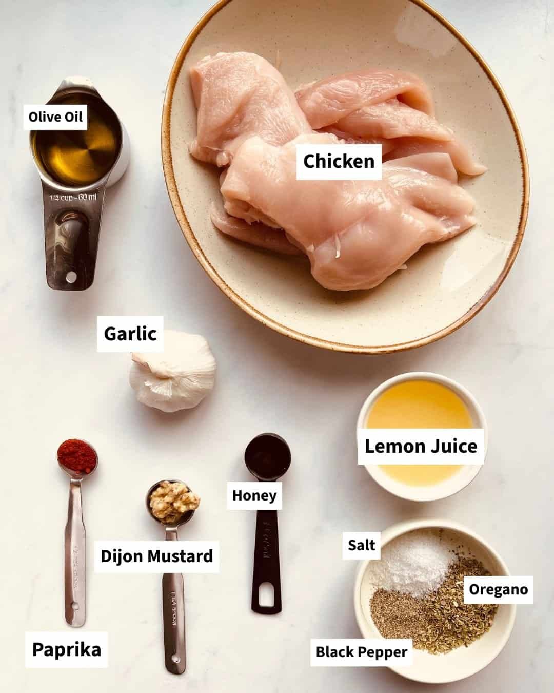 Lemon Garlic chicken marinade ingredients set out on table top counter