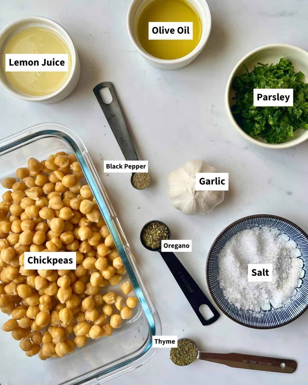  chickpea salad and marinade ingredients on tray