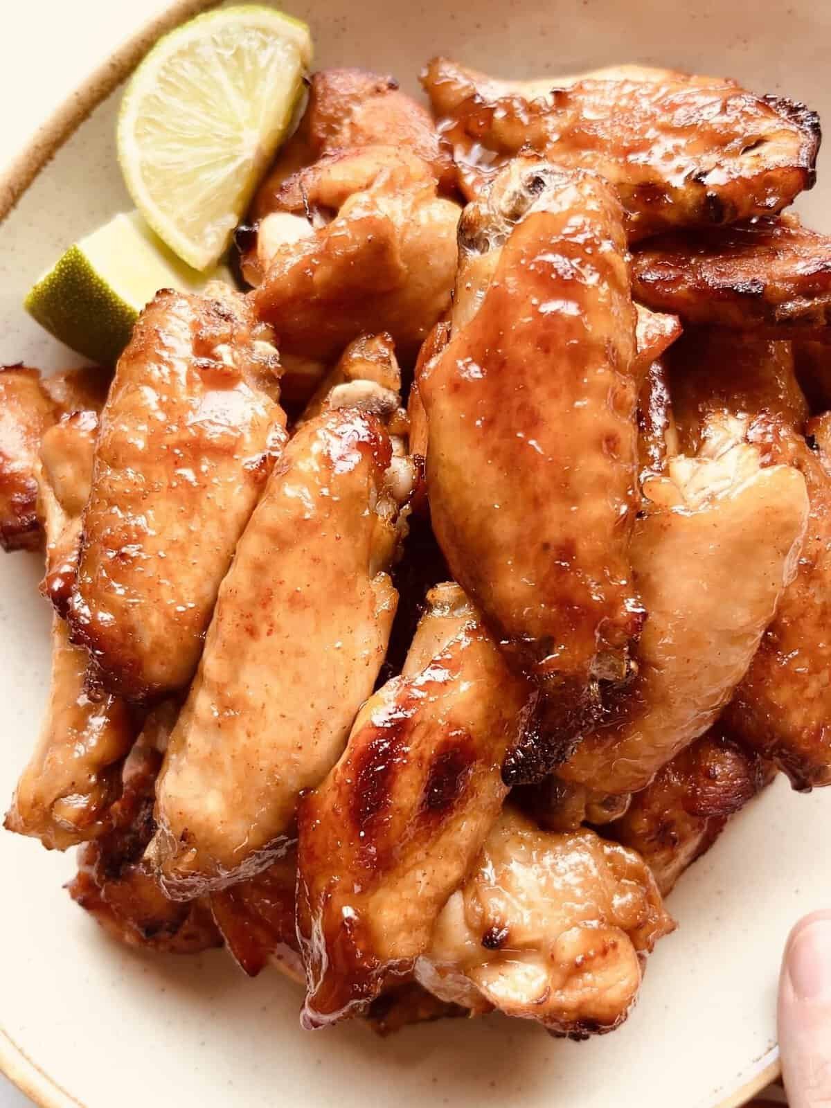 Korean-style spicy chicken wings served with sesame seeds