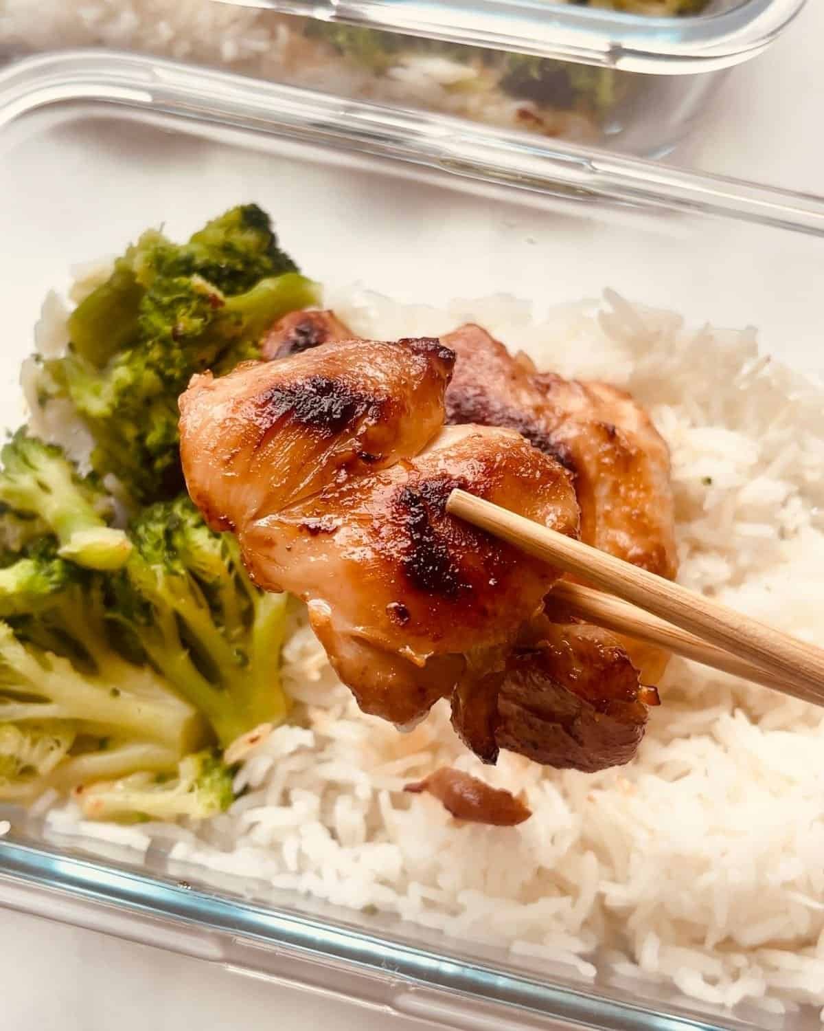 honey garlic chicken with broccoli in glass meal prep container