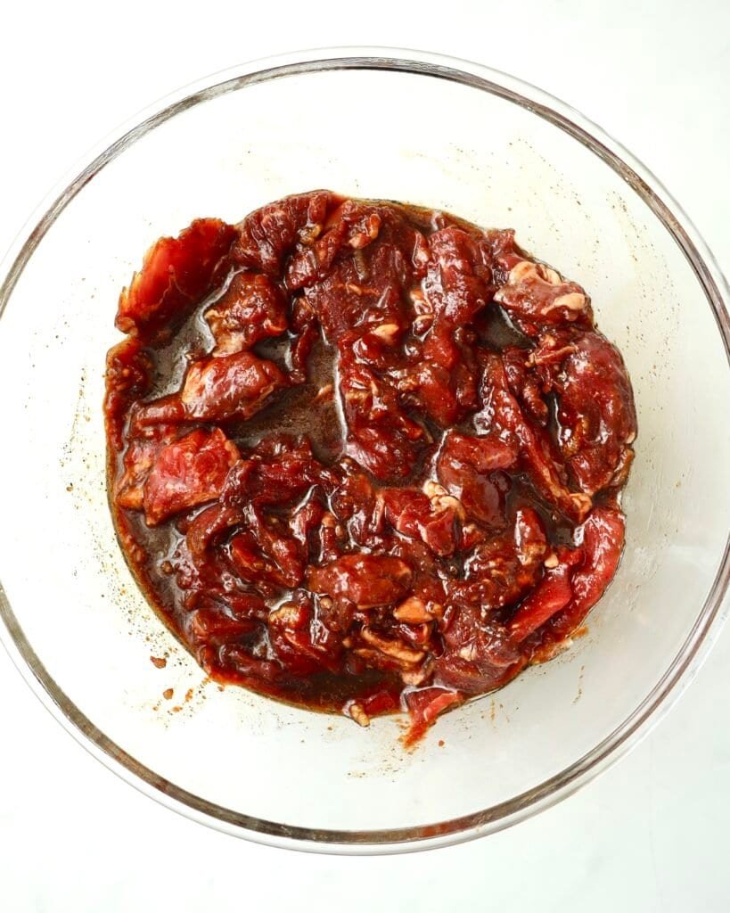 Gochujang beef marinade in a glass bowl for Korean-inspired dishes.