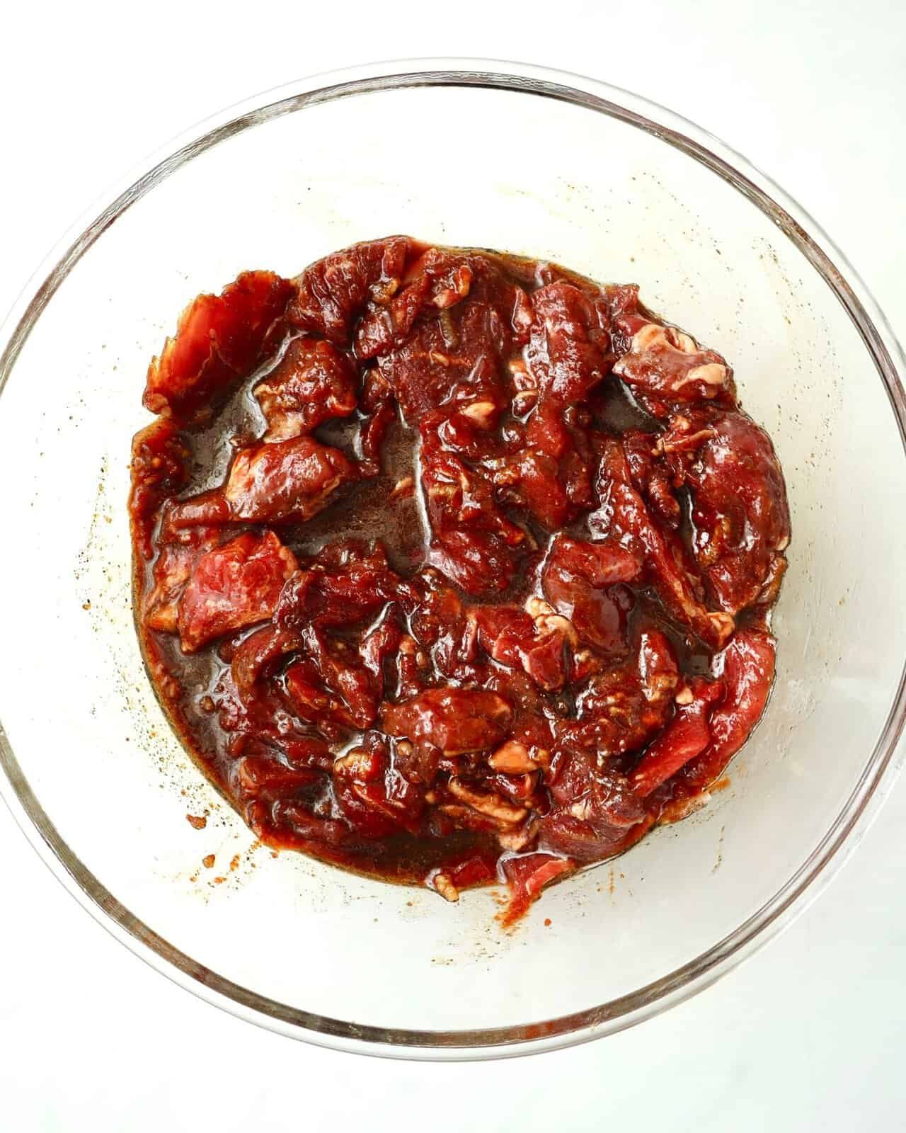 Gochujang beef marinade in a glass bowl for Korean-inspired dishes.