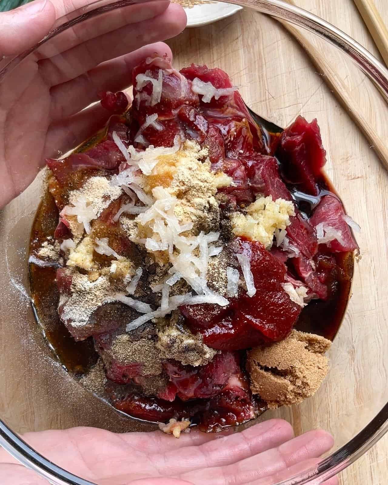 Juicy raw beef marinated with Gochujang and spices for Korean-style beef marinade.