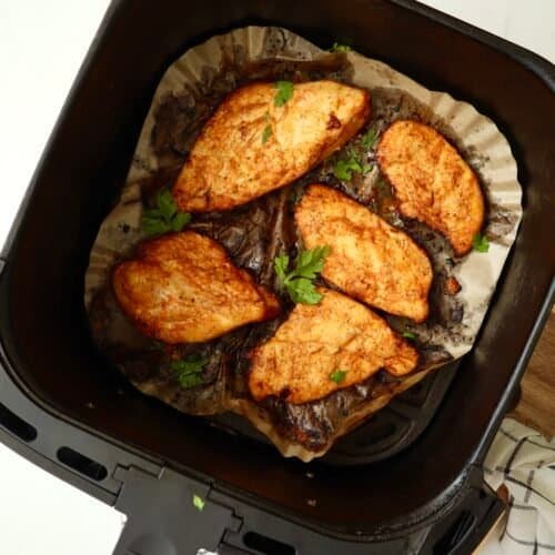 Juicy air fryer chicken cooked until golden brown and crispy on the edges