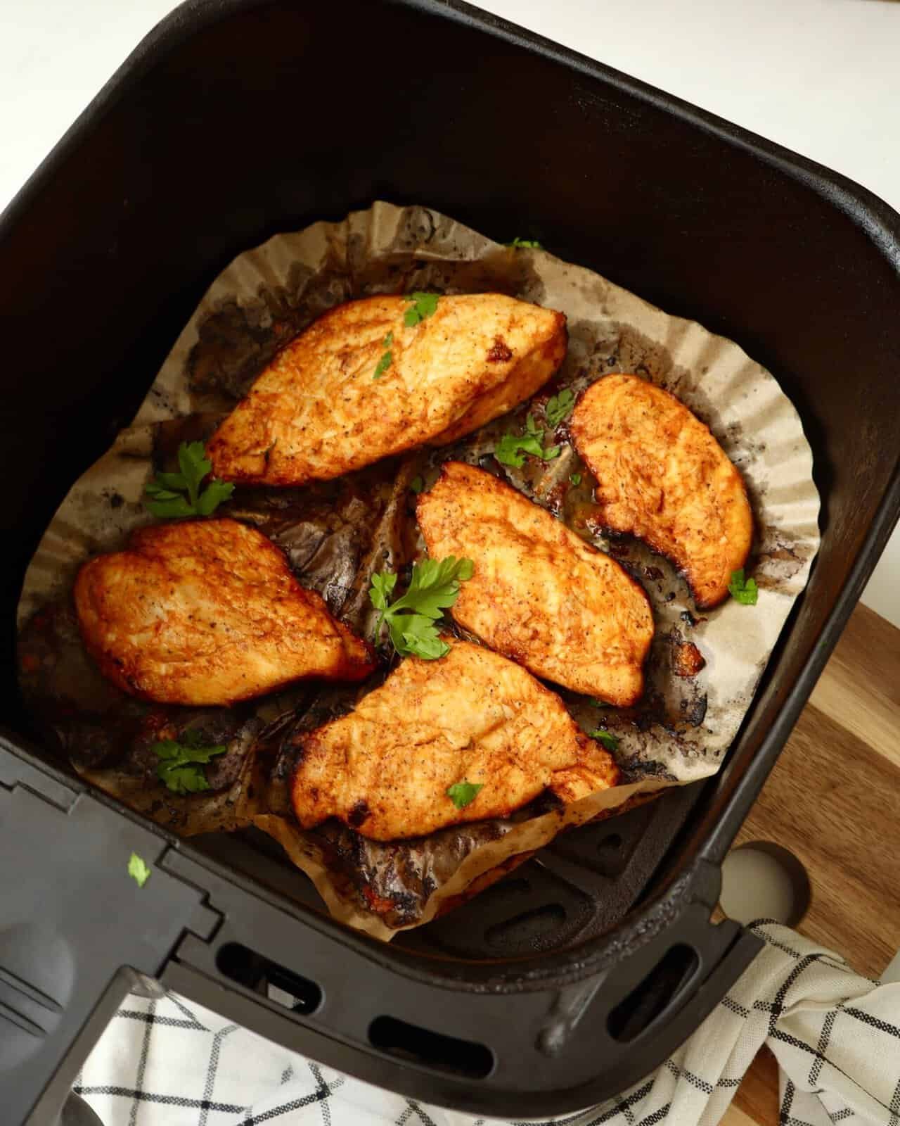 Juicy air fryer chicken cooked until golden brown and crispy on the edges