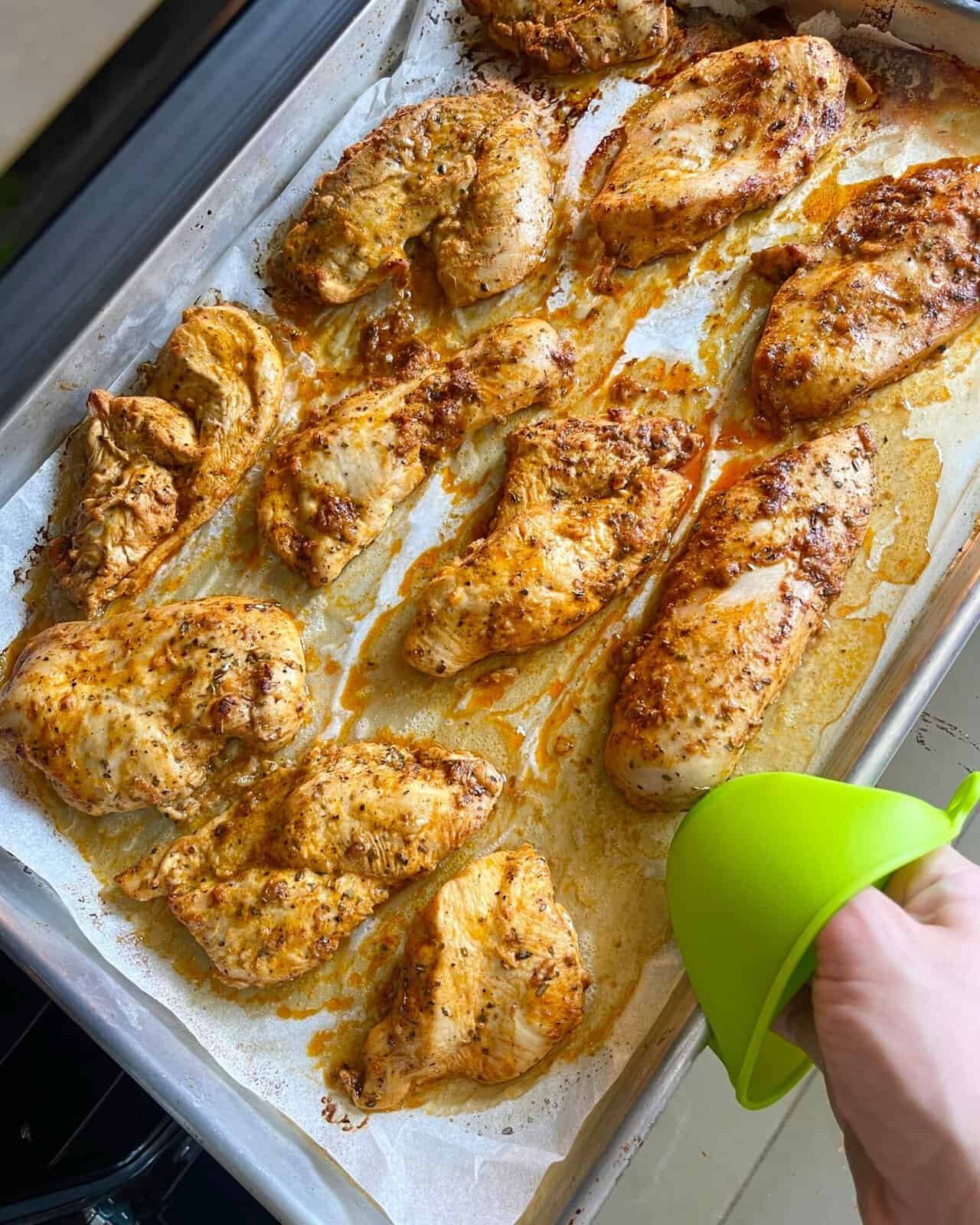 Oven baked chicken cooked until juicy with golden brown edges