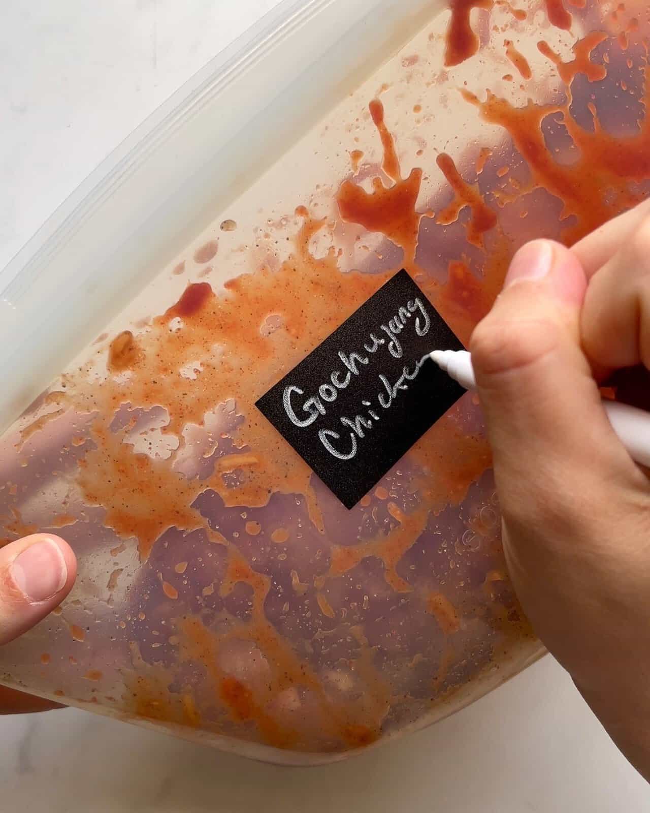 Grilled Hangry But Lazy chicken marinade in a resealable bag with a label.