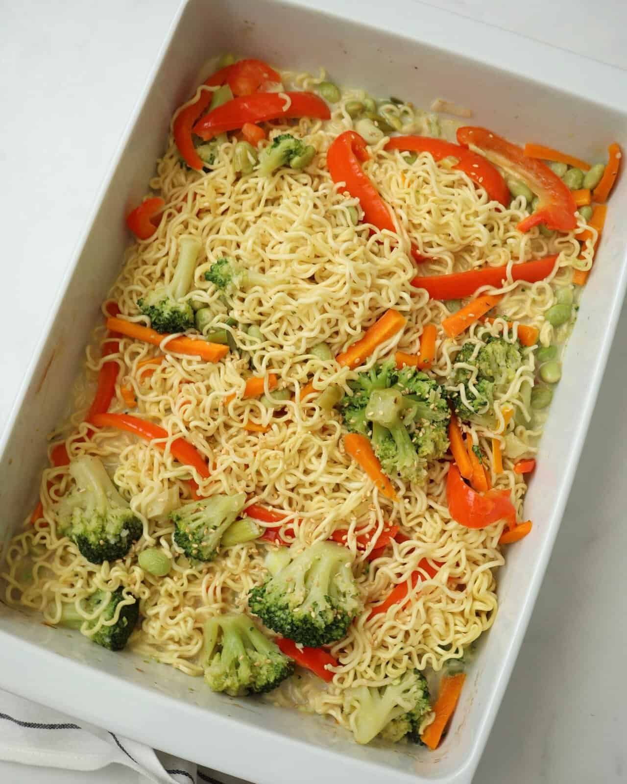 Vegetarian One Pan Baked Ramen Noodles served with colorful vegetables and lime