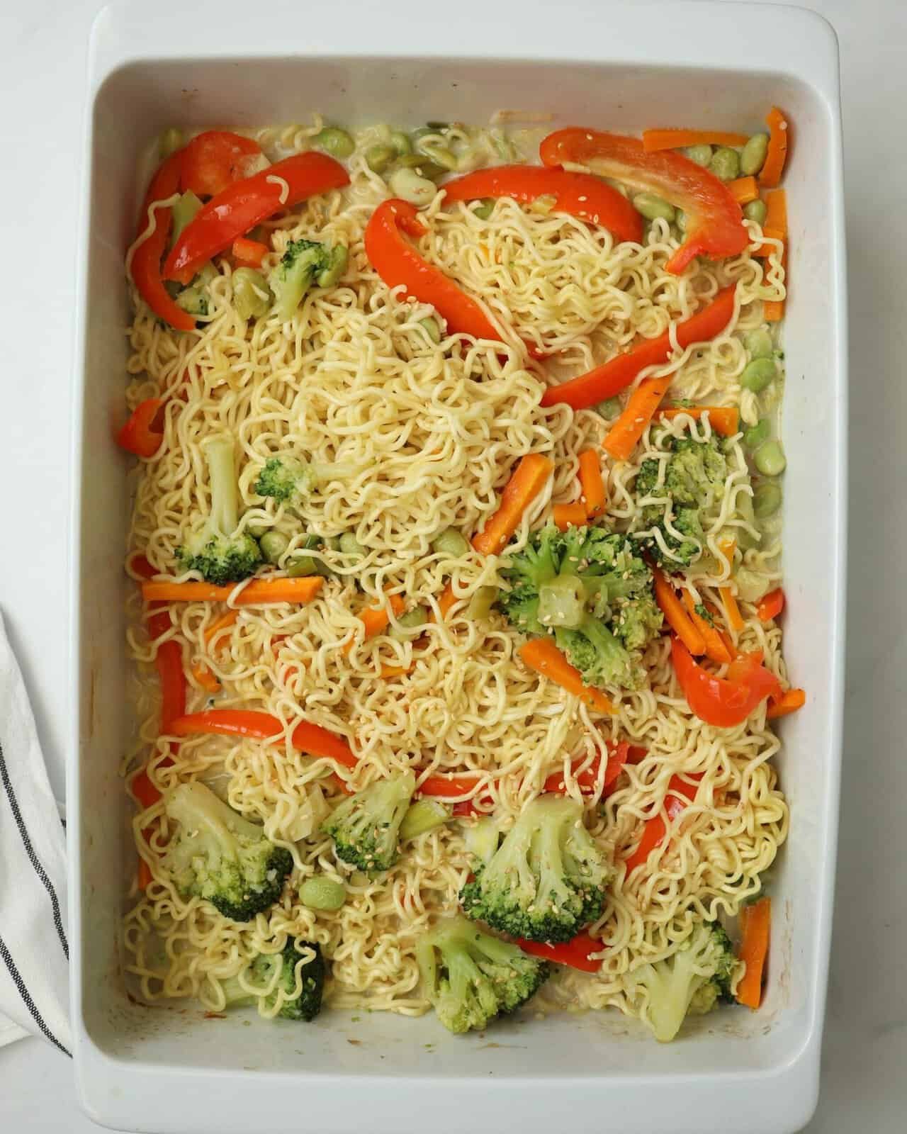 Creamy coconut ginger baked ramen noodles with vegetables in a one pan dinner